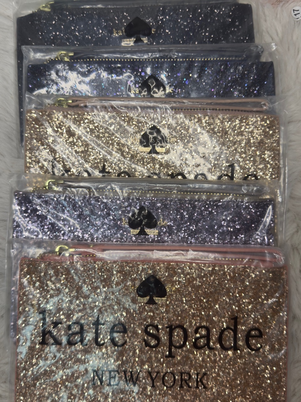 kate spade Glitter Zip Pouch Trio in Gold, Purple, Navy